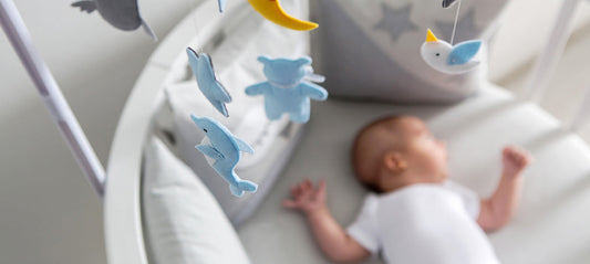 baby sleeps in baby bed