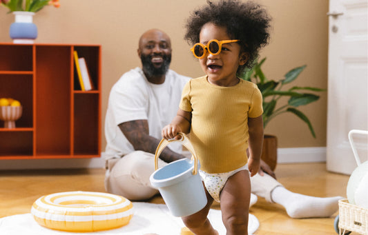 Child learns to pack the diaper bag