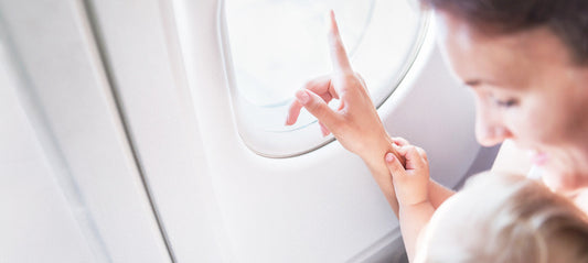 Mother with child on the airplane