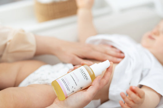 Baby is massaged with Lillydoo almond oil.