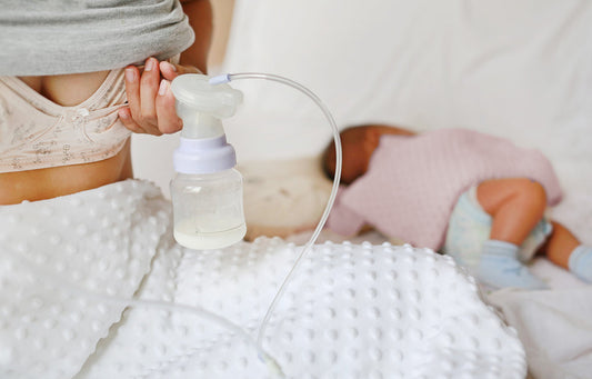Woman using a breast pump