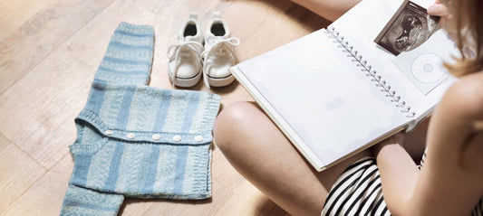 Woman looking at her pregnancy journal