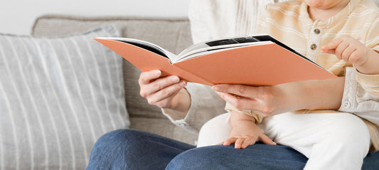 Mom and baby reading a story together